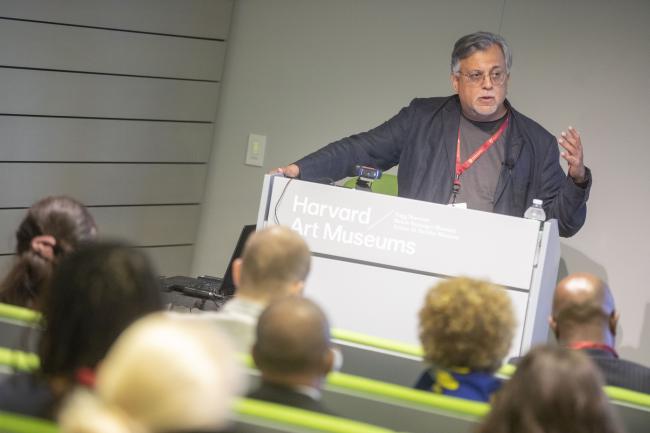 A guest speaker lecturing a group of Harvard Affiliates