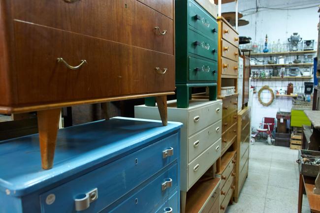 image of furniture stacked up, presumably donated.